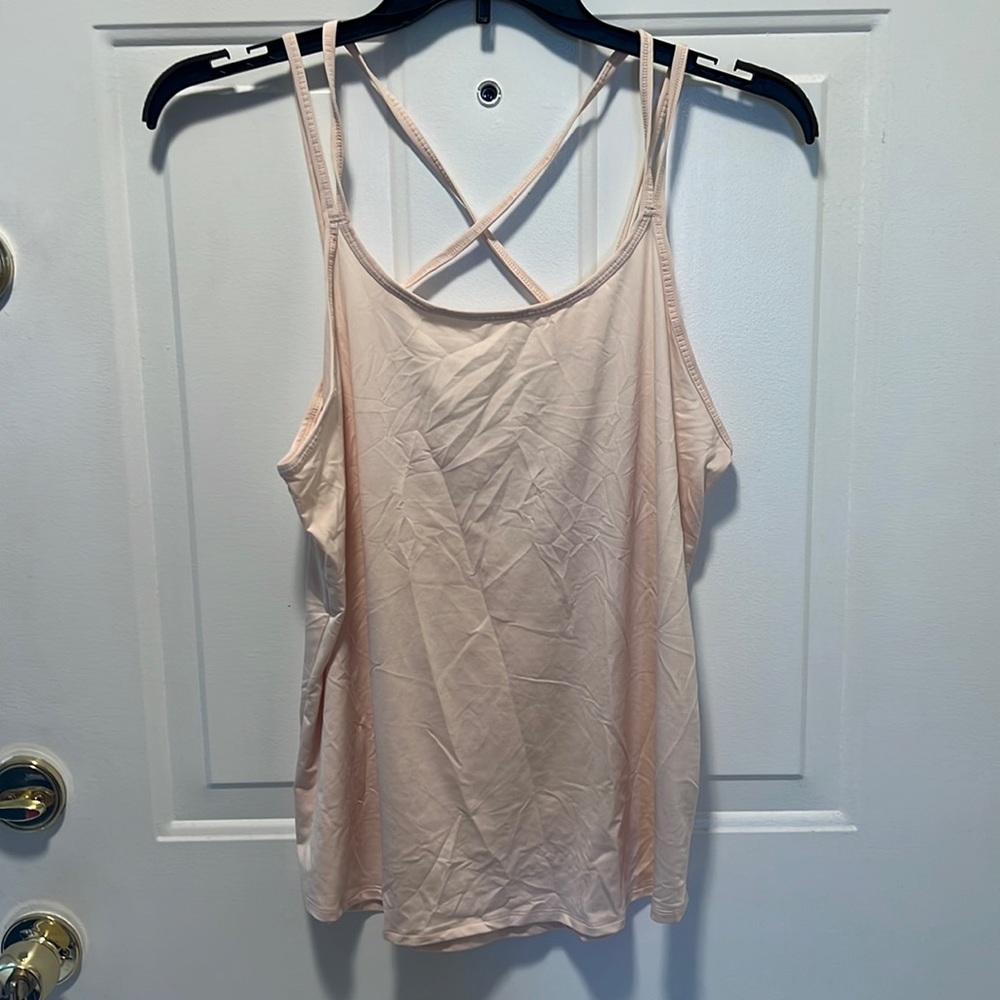 Cute peachy Fabletics top with fun straps